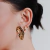 Brinco Orelha com Piercing Surreale