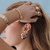 Image of Brinco Puffer Glam