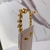 Imagem do Brinco Ear Cuff de Franjas Dourado e Pedras Prata - Base Dourada
