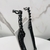 Brinco Ear Cuff Preto com Pedras e Franjas - Base Grafite - loja online