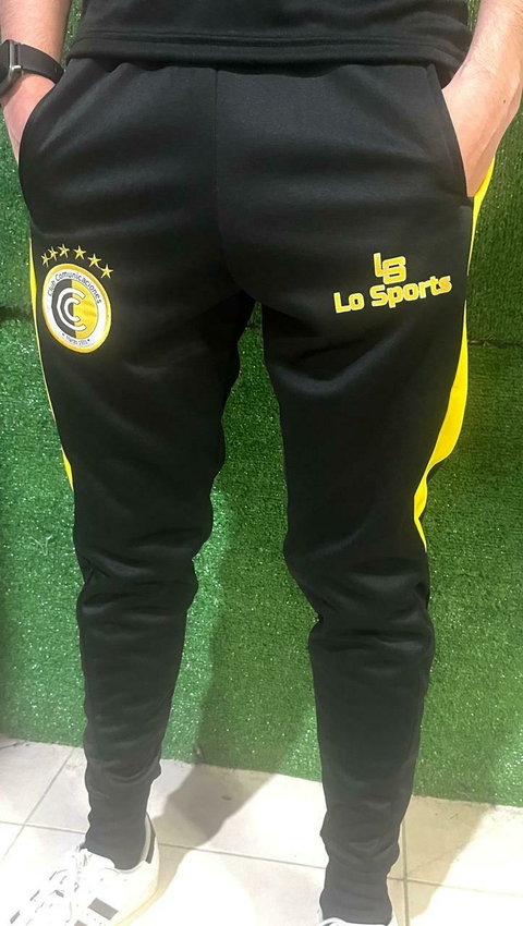 Pantalon deportivo con puño y cierre