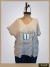 Remera rayada gris con estampa plateada ART8418 - comprar online