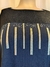 Blusa lurex rayas azul con detalles brillantes en el diseño.