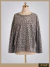 Buzo Darlon Animal print gris gastado ART8823