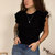 Musculosa Caterina Negro en internet