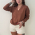 Sweater Mafalda Tostado en internet