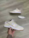 Nike Dunk Low Swoosh Dourado
