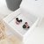 DIJE DE MICKEY Y MINNIE MOUSE CON PIEDRAS RECONSTITUIDAS en internet