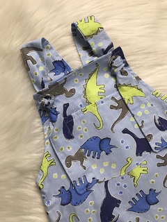 Jardineira Ilhós Dinossauros Azul Claro - comprar online