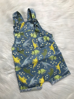 Jardineira Ilhós Dinossauros Azul Jeans