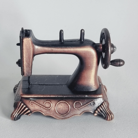Máquina de Costura Metal