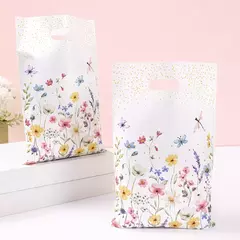 Bolsa riñón "floral". Precio por unidad.