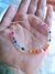 Pulsera hilo marrón multicolor y perla