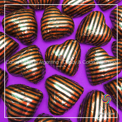 10 un. Bombones de chocolate suizo en forma de corazón relleno de dulce de leche envuelto en papel metalizado - naranja y negro rayado - pack 10 unidades