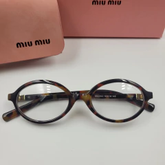 Imagem do Oculos de Sol p/Grau Miu-Miu Oval Mu04z cores variadas