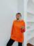 BUZO OPTIMISM NARANJA en internet