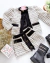 Conjunto de saia e casaco tweed preto e branco Manuela na internet