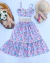 Conjunto de saia longa e top tropical