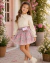 Conjunto de saia com short floral rosa e blusa manga longa babados