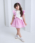 Conjunto de salopete rosa e blusa off de amarrar Laila (acompanha laço de cabelo) - comprar online