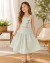 Conjunto de saia midi e cropped listrado de verde e branco com aplicações florais Bella