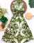 Conjunto de saia midi verde com branco de botões e blusa alça franzida e detalhe amarração verde - comprar online