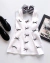 Vestido branco com lacinhos pretos - comprar online