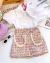 Conjunto de saia tweed e camisa branca manga bufante