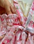 Conjunto de salopete xadrez com vermelho, BLUSA off white e laços de cabelo Olívia na internet