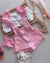 Conjunto de Salopete rosa margaridas e Ciganinha laise branca