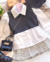 Conjunto de saia plissada Tweed , camisa branca e cropped courino preto - comprar online