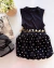 Conjunto de saia poá balonê e blusa preta - comprar online