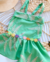 Conjunto de short e blusa peplum verde Flora