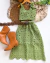 Conjunto de saia midi e cropped flores verde pistache