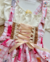 Conjunto de salopete xadrez com vermelho, BLUSA off white e laços de cabelo Olívia - Estilosa Kids / Loja Online Moda Infantil