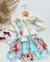 Conjunto de salopete floral azul e blusa off laço Aurora