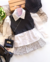 Conjunto de saia plissada Tweed , camisa branca e cropped courino preto