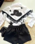 Conjunto de camisa branca com franja preta e short saia laço paetê preto boiadeira - loja online