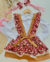 Conjunto de salopete coração floral e blusa branca Flora (acompanha laço de cabelo) na internet