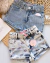 Imagem do Short jeans lacinhos
