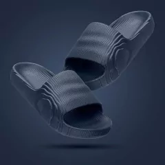 Chinelo Slide AquaWalk em cor azul escuro, com design moderno 3D e faixa larga na parte superior.