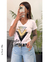 Remera en algodón peinado premium, aplique glitter lentejuelas, triangulos +colores x talles - santas no hay