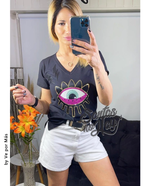 Remera en algodón peinado premium, aplique ojos rayos lentejuelas +colores xtalle