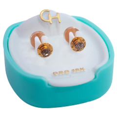 abridor de oro 18k.modelo facetado con stras