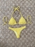 Tanga Semi Fio Rebatida Amarelo Manteiga Mônaco (BUSTO NÃO INCLUSO). na internet