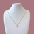Colar Letra Cravejada Zircônia Cristal Banhado a Ouro