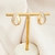 Brinco Gota Metade Cravejada Cristal Banhado a Ouro - comprar online