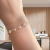Pulseira Corações Maiores e Menores Cristais Banhada a Ouro - comprar online