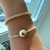 Pulseira Riviera Cristal Com Bola Lisa Banhada a Ouro - comprar online