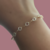 Pulseira Pedrinhas Cristais Banhada a Ouro na internet
